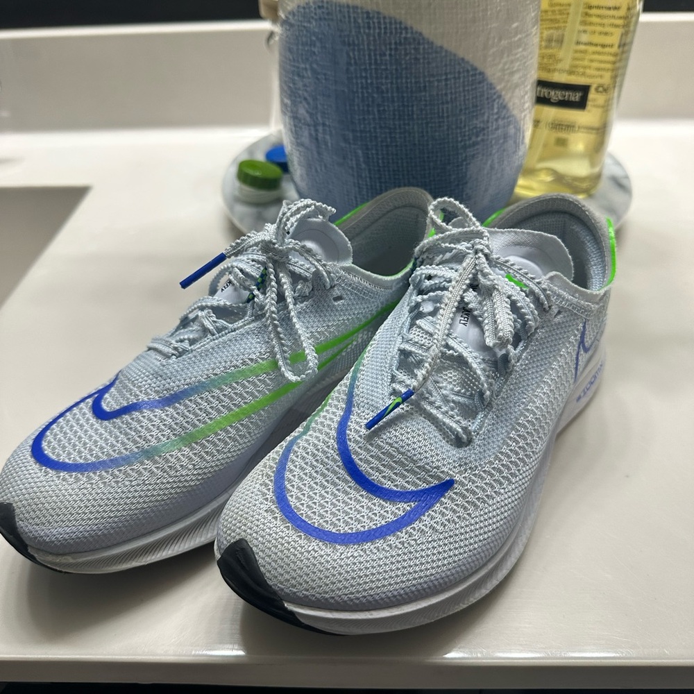 Nike Kids Sneakers in Gray with Blue and Green Accents